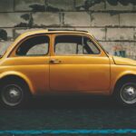 negative-space-classic-fiat-5-yellow-car-ilya-yakover-thumb-1